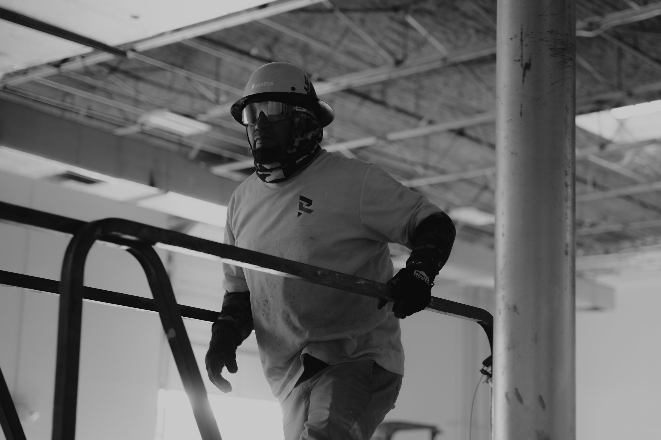 Resolver crew member on scaffolding