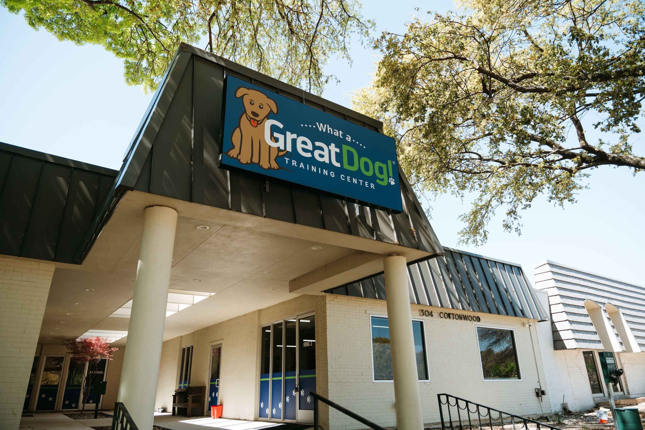 Exterior signage at the What a Great Dog! Training Center in Richardson, TX