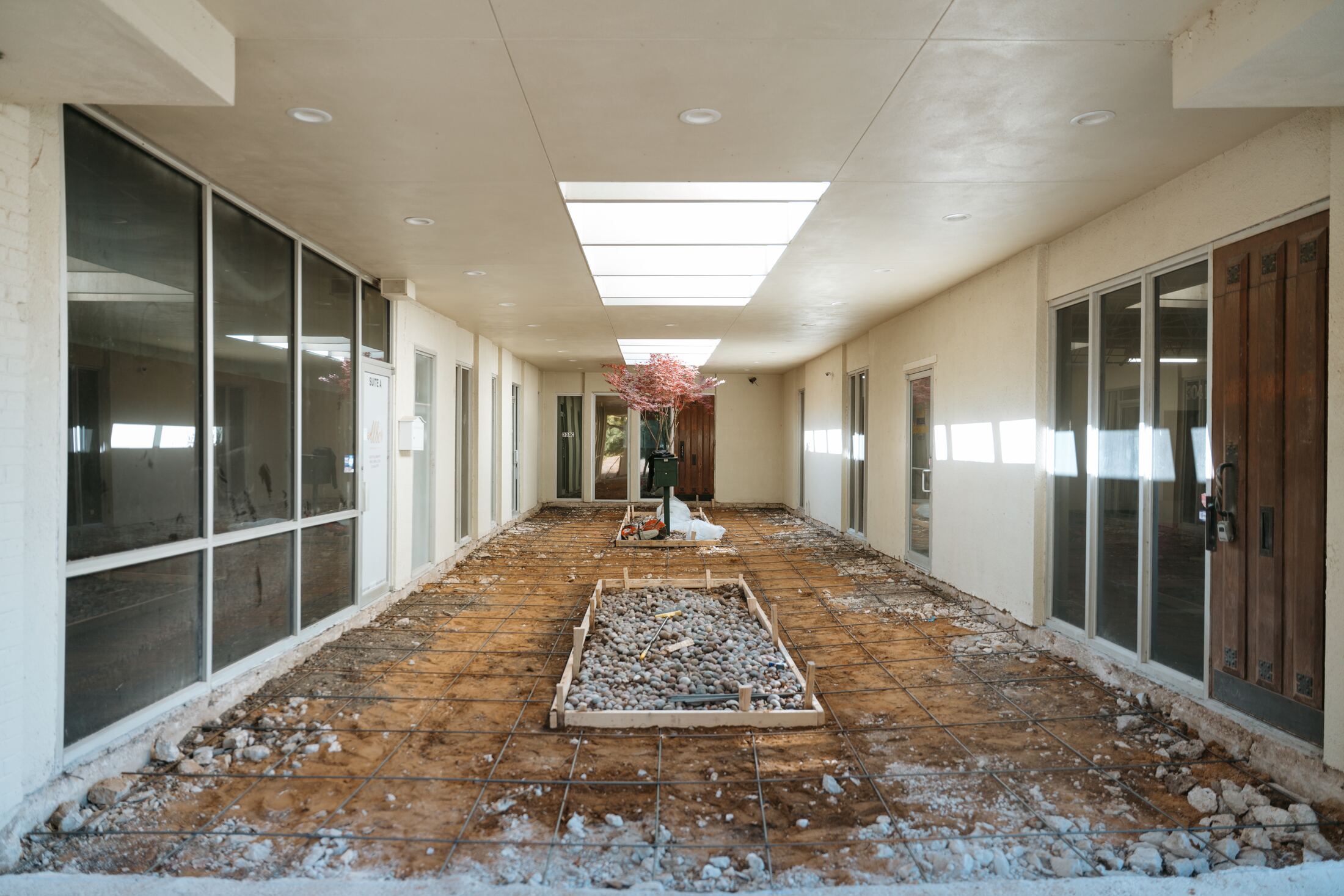 Corridor floor torn up during early demo at What a Great Dog! Training Center